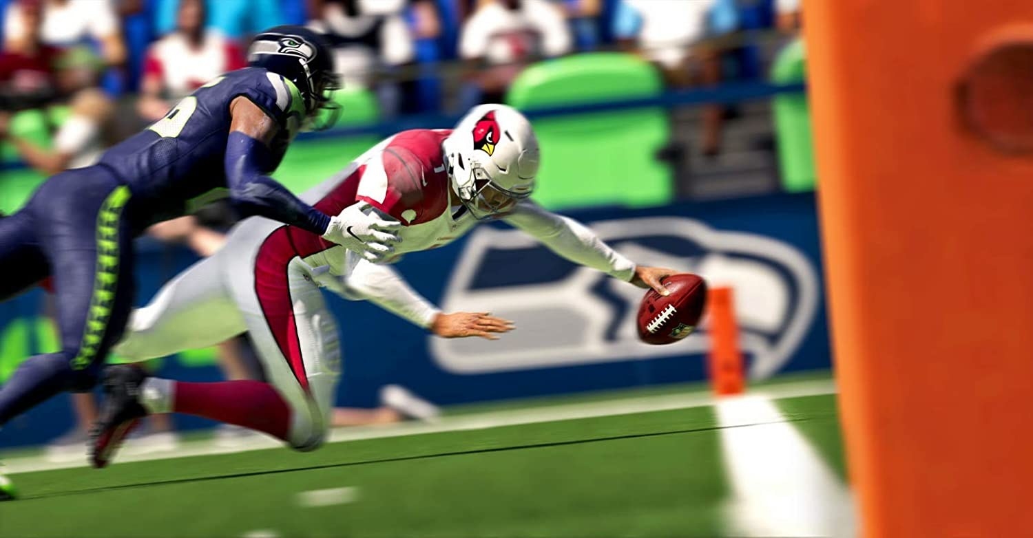 Kyler Murray shedding a tackle and diving for the goal line