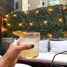 final Bartesian cocktail with a pretty backdrop 