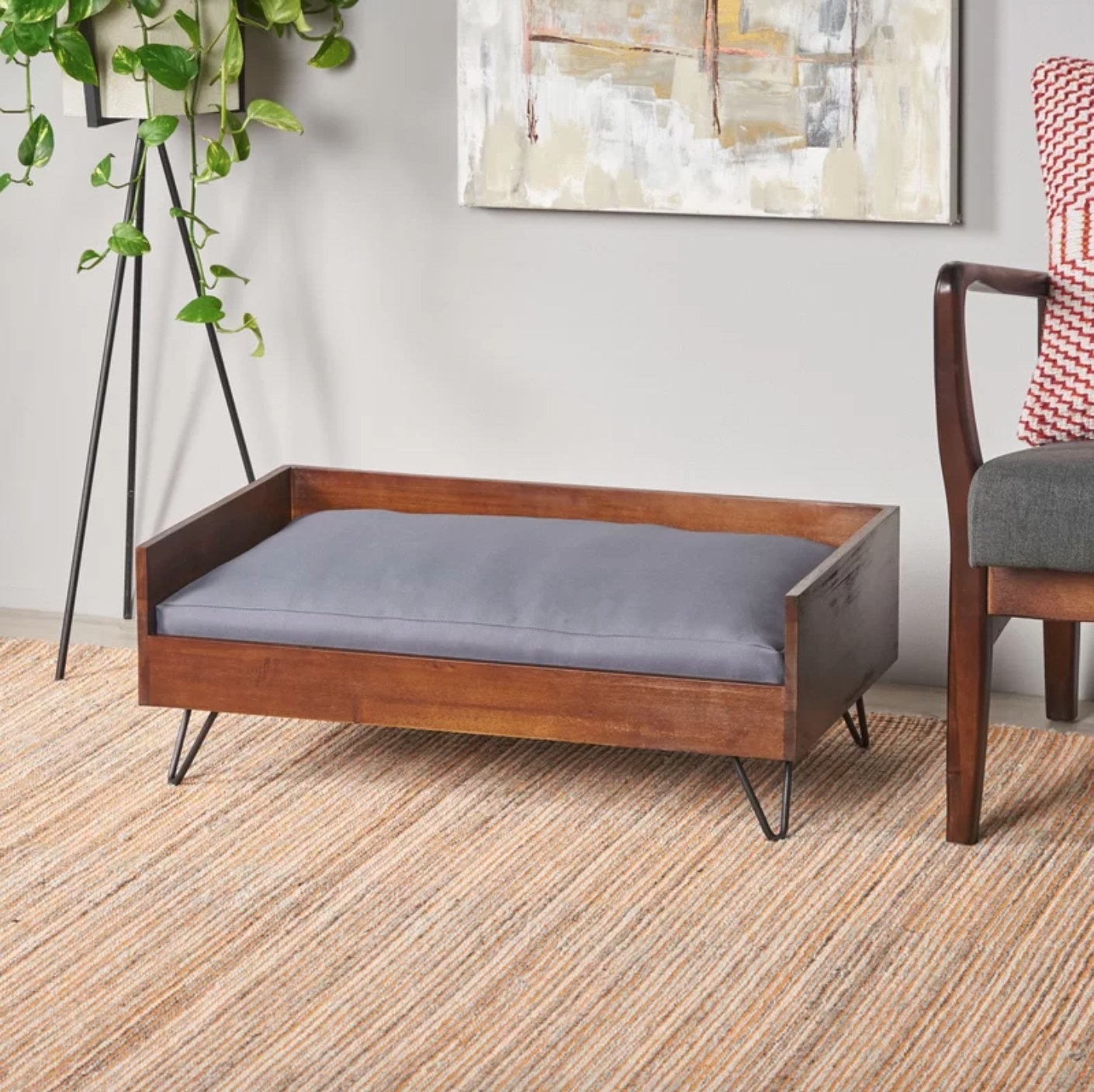 The mid-century dog bed in dark oak/ black
