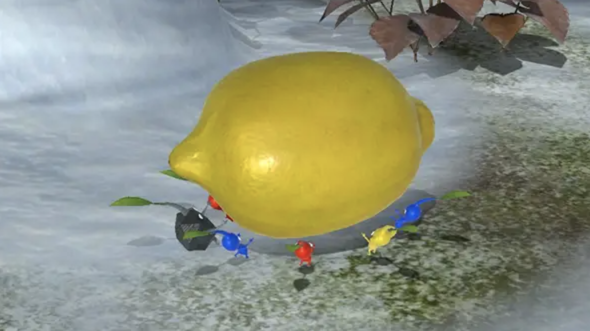A group of small characters surrounding a lemon 