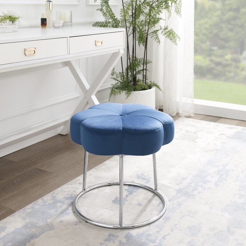 The blue vanity stool