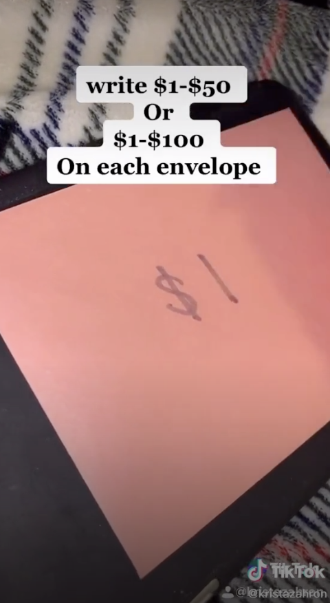 A TikTok screenshot showing &quot;$1&quot; written on an envelope and text explaining how to complete the challenge