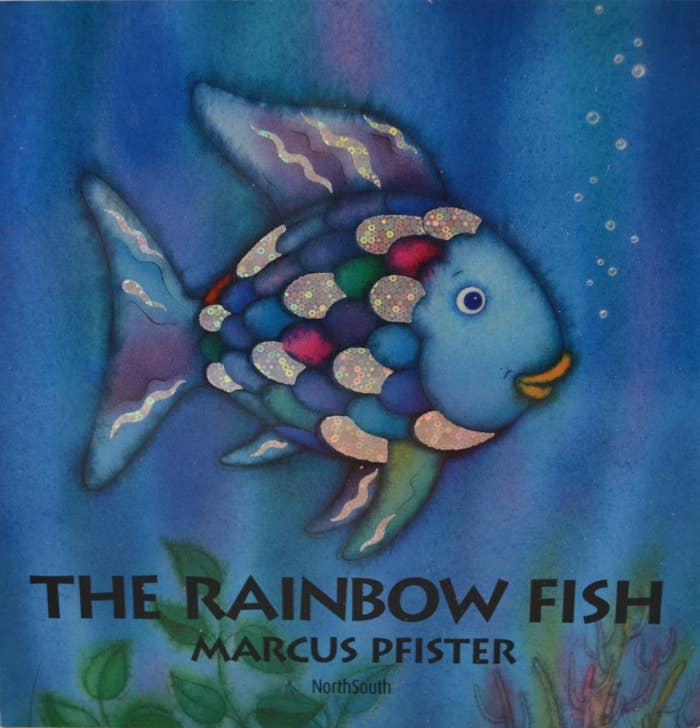 The book cover for &quot;The Rainbow Fish&quot; featuring a blue fish.