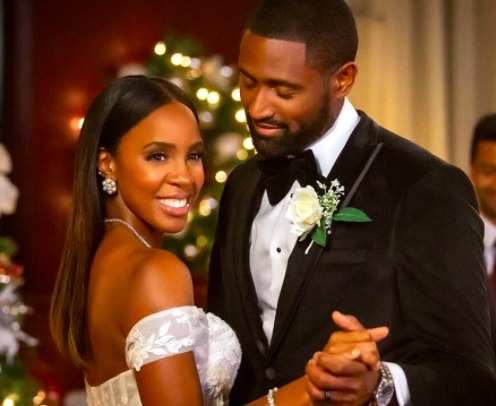 Kelly Rowland and Thomas Cadrot dance together in wedding clothes
