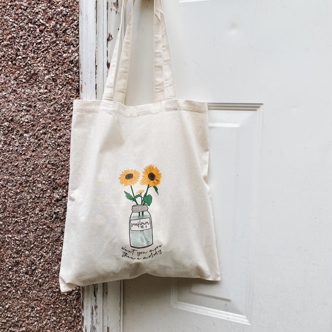 The tote bag hanging on a door handle