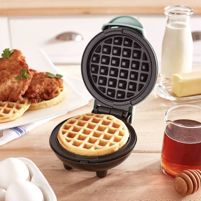 The mini waffle maker with a waffle made