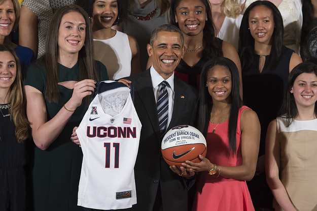 US President Barack Obama (C) poses with players Moriah Jefferson (2nd L) and Breanna Stewart (L) at the White House in Washington, DC, May 10, 2016, during an event welcoming the 2016 NCAA Champion UConn Huskies women's basketball team.
