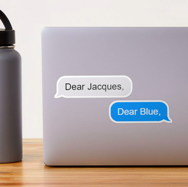 A gray text bubble sticker that reads "Dear Jacques," and a blue text bubble sticker that reads "Dear Blue," both stuck to the back of a laptop