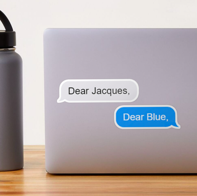 A gray text bubble sticker that reads &quot;Dear Jacques,&quot; and a blue text bubble sticker that reads &quot;Dear Blue,&quot; both stuck to the back of a laptop