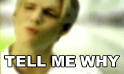 A gif of Nick Carter of The Backstreet Boys singing &quot;Tell me why.&quot;