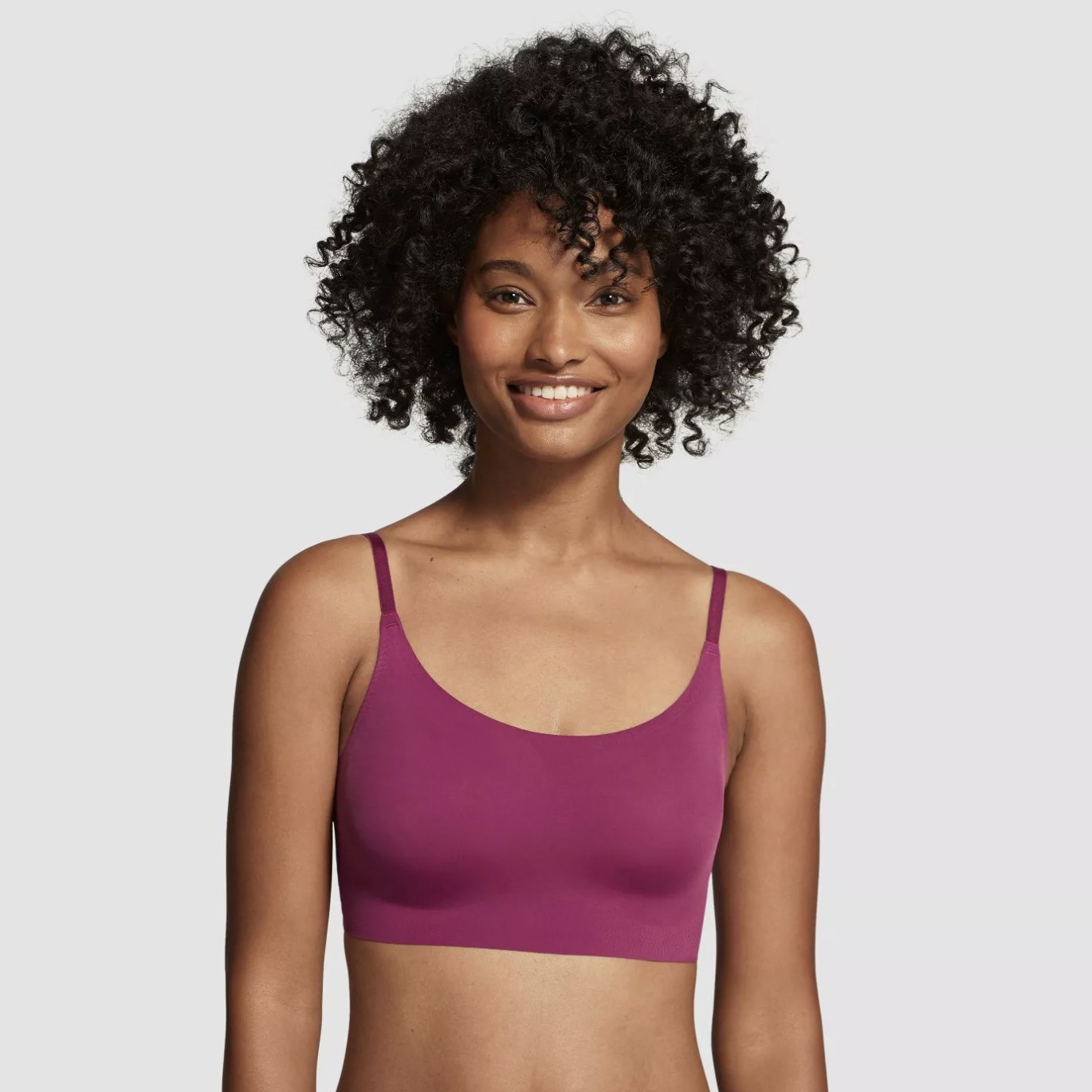 Model is wearing a purple scoop-neck bra