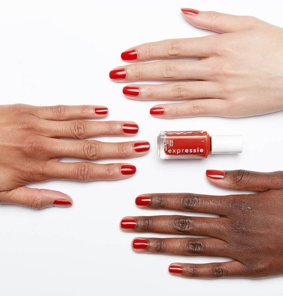The nail polish painted on three different skin tones to show how the color varies