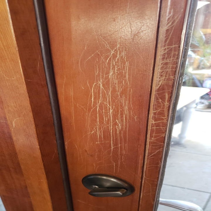 Reviewer before image of scratched up door