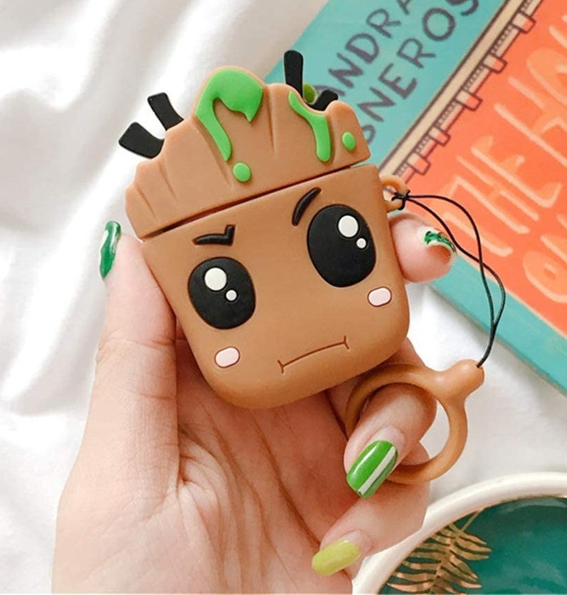 A person holding the Groot case