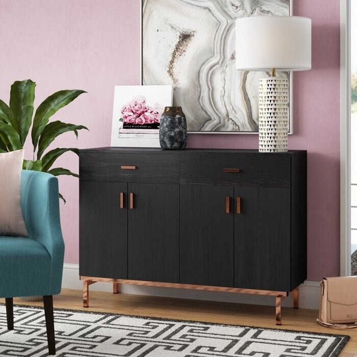 the willa arlo sideboard in a decorated living room