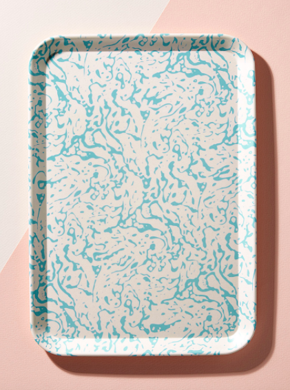 A large marbled tray on a graphic background