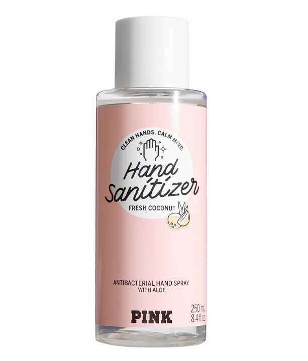 Pink squeeze bottle of Fresh Coconut hand sanitizer.