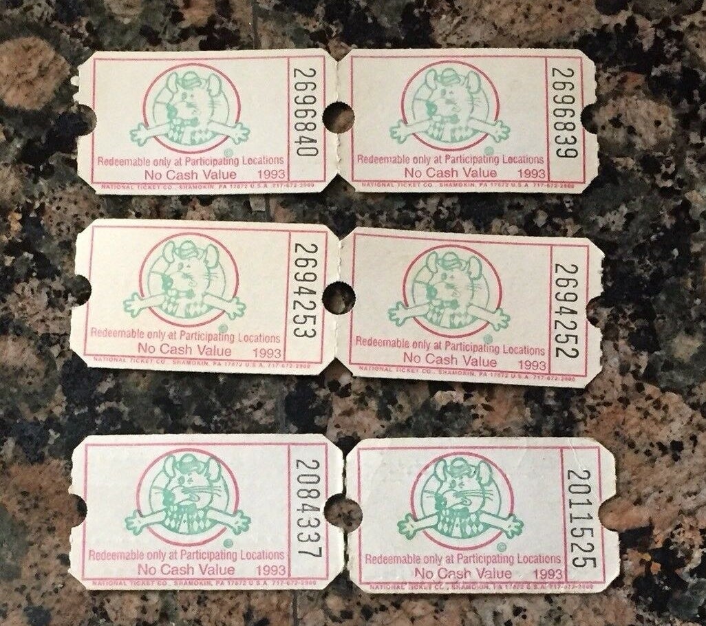 Six  Chuck E. Cheese&#x27;s tickets from the early &#x27;90s.