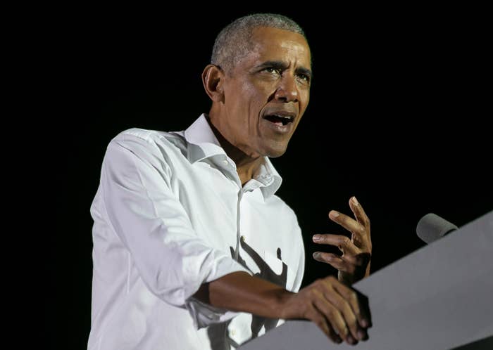 Former President Barack Obama speaks during a drive-in rally near Florida International University in Miami