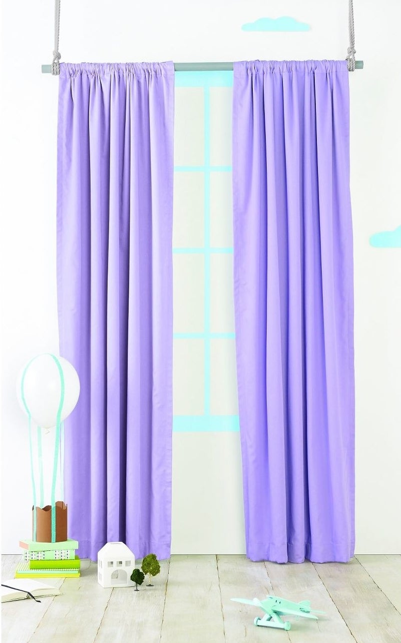 The curtains, which hang all the way to the floor