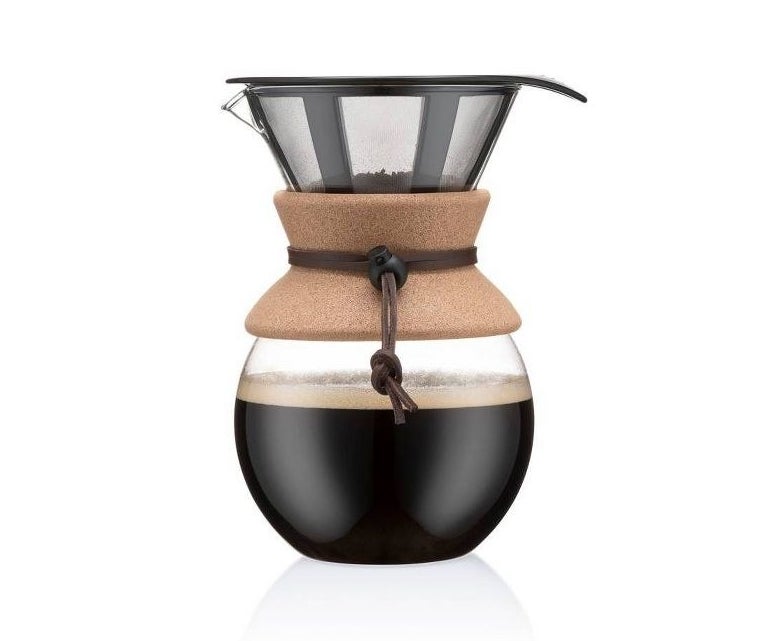 The pour-over coffee maker, which is a large glass carafe with a cork panel in the middle so that you can hold it, and a mesh filter that fits into the funnel-shaped top