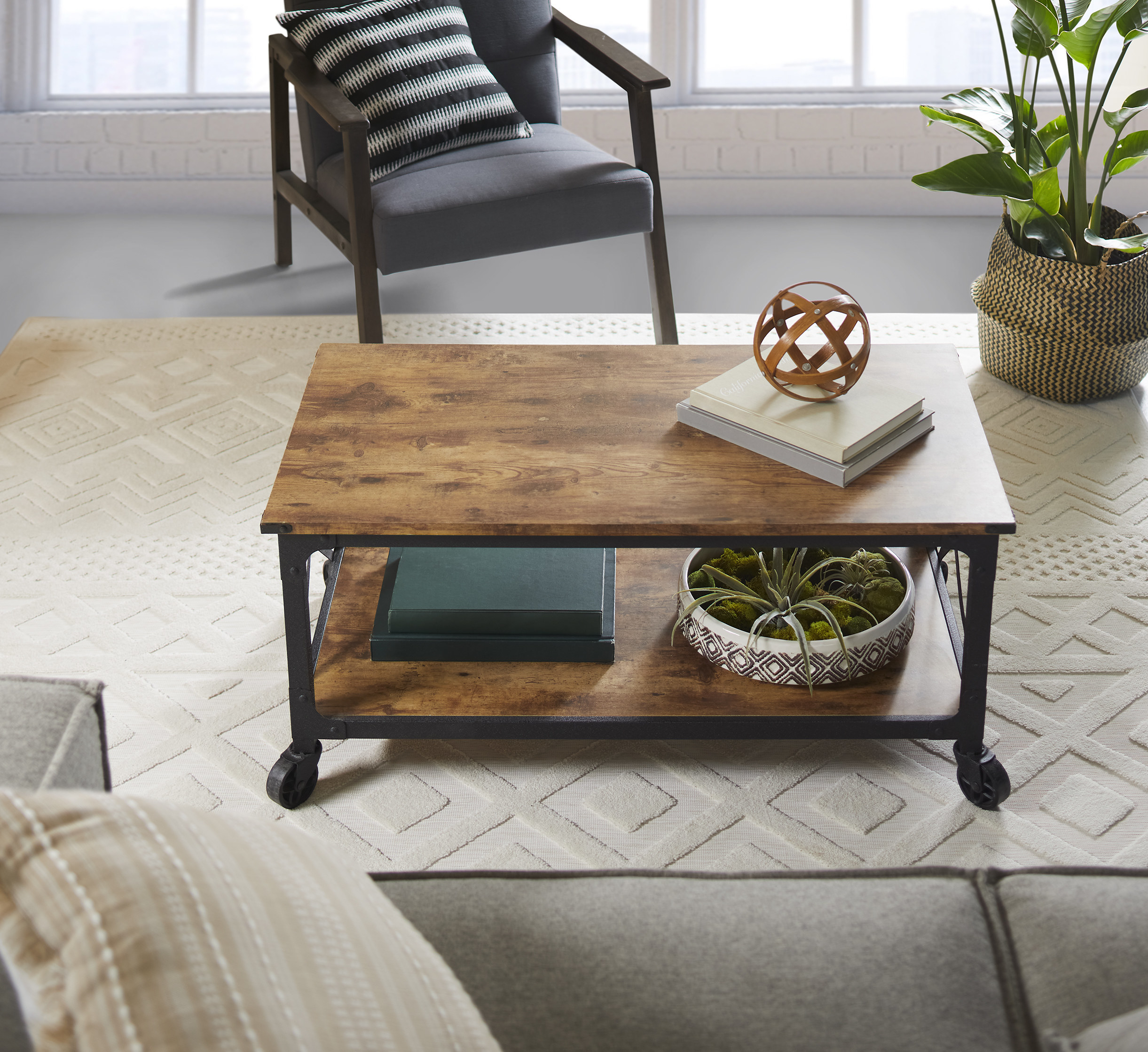 The dark wood coffee table in a living room