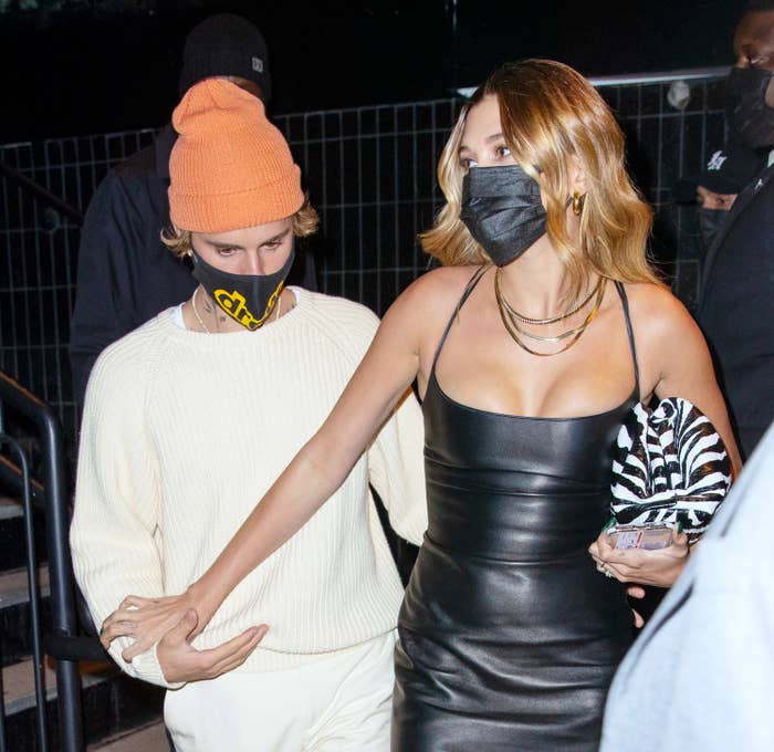 Justin Bieber hold hands with Hailey Bieber as they depart an SNL afterparty