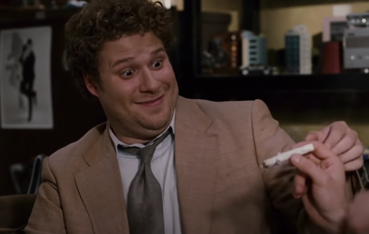 Rogen, in The Pineapple Express, looks at a joint like its the love of his life