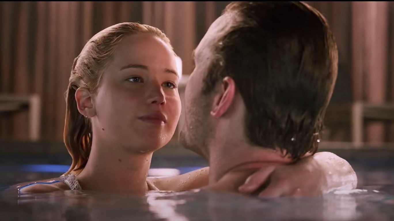 Lawrence and Pratt cuddle in a pool