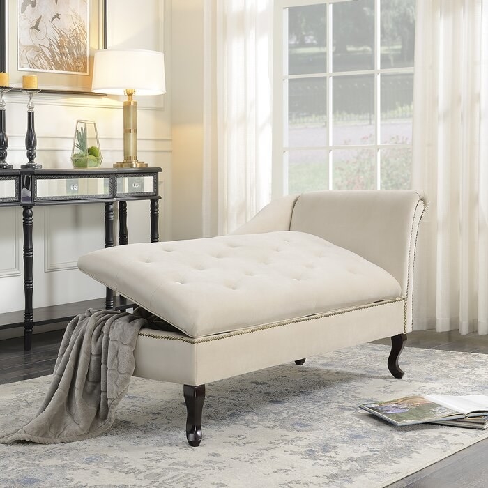 the beige house of kampton kroeker storage chaise slightly open in a decorated living room