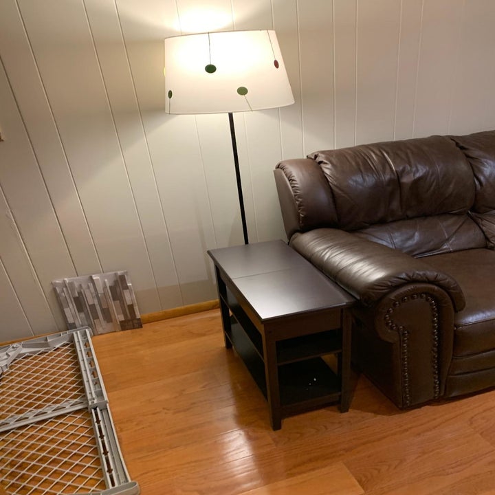 reviewer image of the dark brown HOMECHO Modern End Side Table in a living room