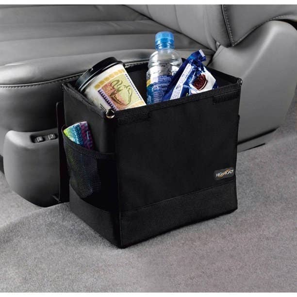 black waste basket made for the car