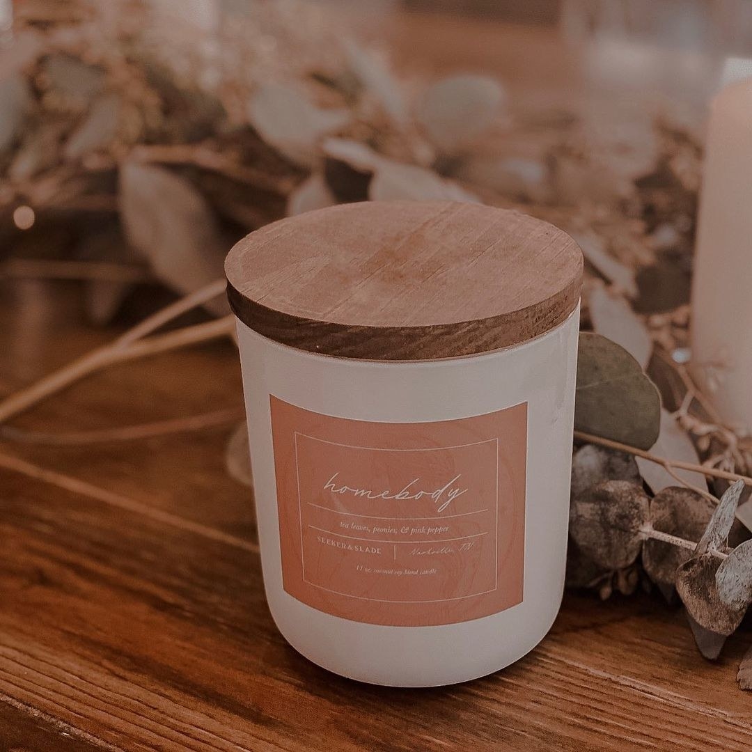 the candle with a label that says &quot;homebody&quot;