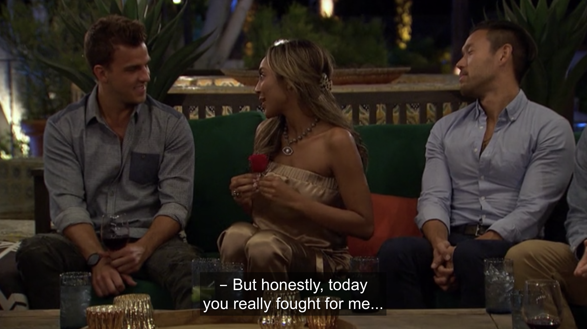 Tayshia presenting Noah with the date night rose 