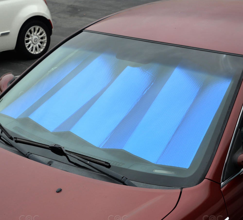 blue sunshade on the inside of a car