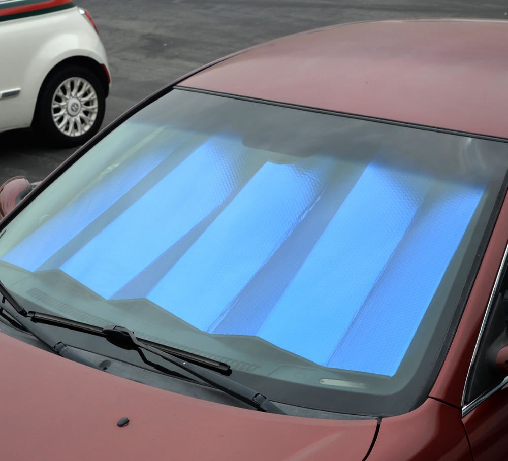 blue sunshade on the inside of a car