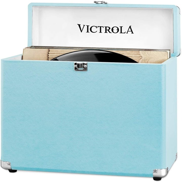 The case in turquoise open and displaying the Victrola branding