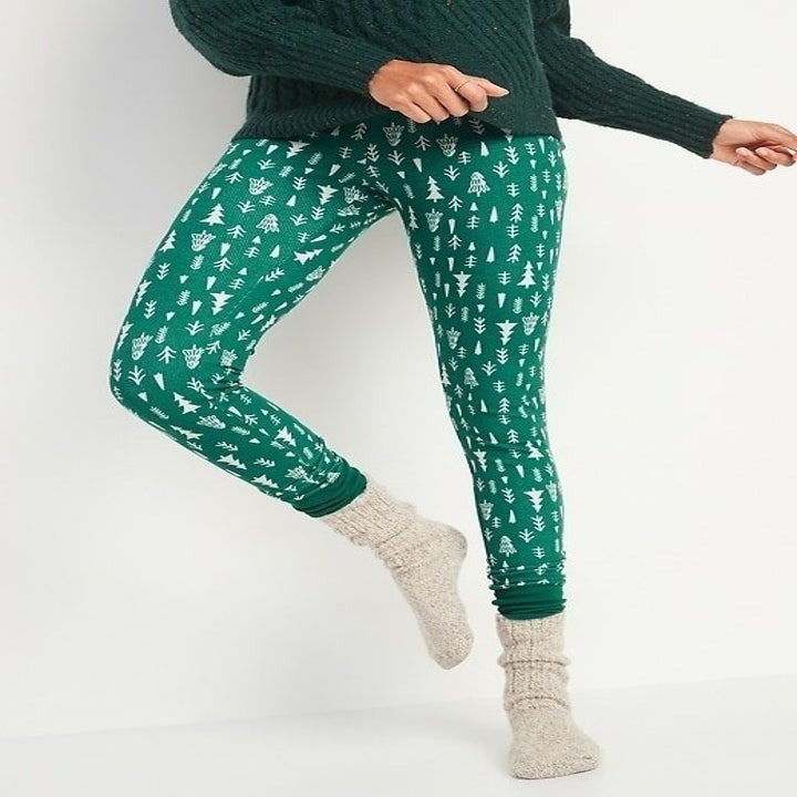 another model in tighter fighting green pants with trees on them