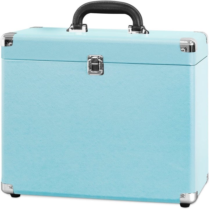 The turquoise case closed showing the black handle