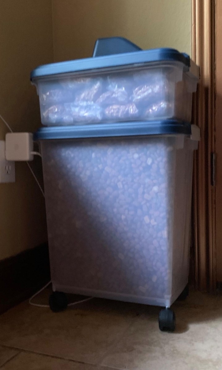 The IRIS pet storage container in clear plastic with blue lids
