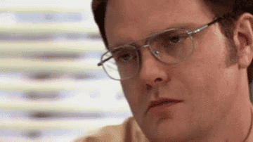 Dwight looking annoyed on The Office
