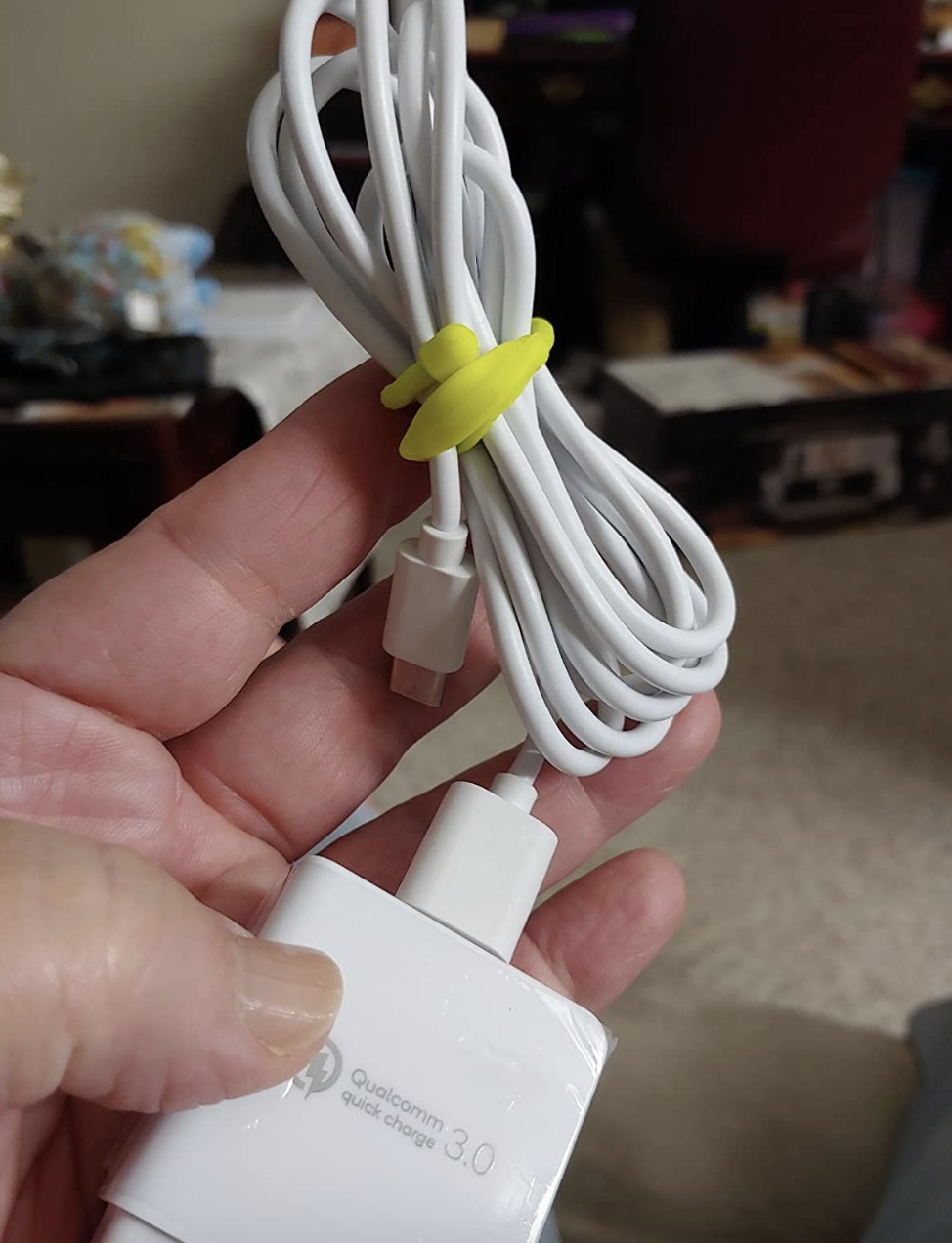 reviewer photo of yellow tie around white chord