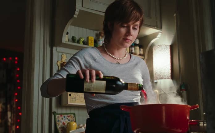 Julie from "Julie & Julia" cooking by putting wine in a pot