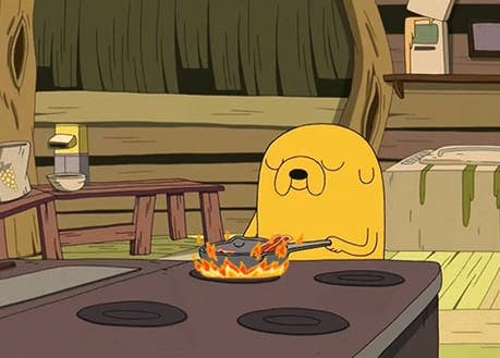 Jake the Dog from &quot;Adventure Time&quot; making bacon and eggs