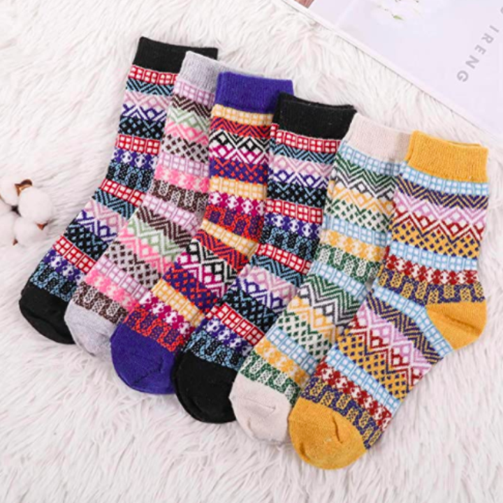 Six pairs of aran-style patterned socks