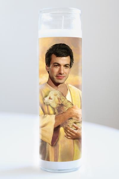The prayer candle which depicts Nathan Fielder as a disciple carrying a lamb