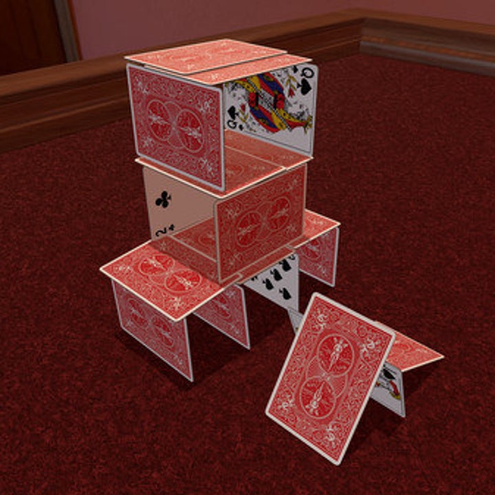 A screenshot from the online game showing a digital stacked card house 