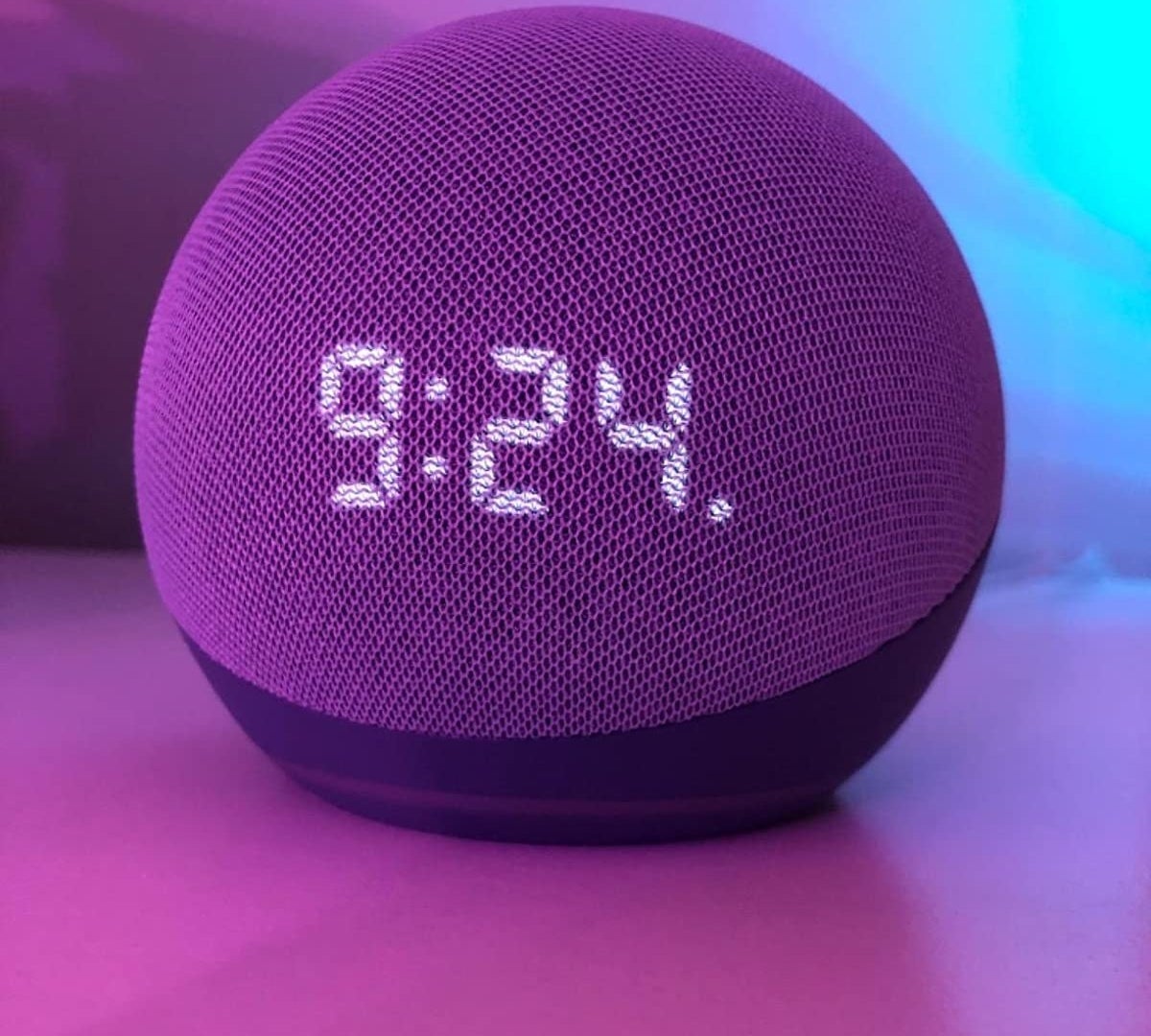 The Echo Dot 4th Gen displaying the time &quot;9:24&quot;