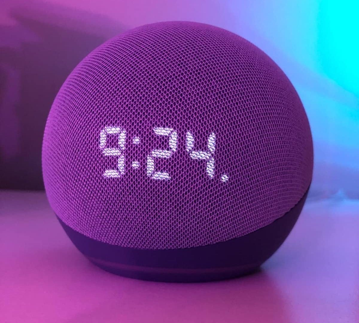 The Echo Dot 4th Gen displaying the time &quot;9:24&quot;