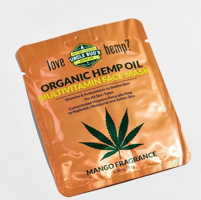 the orange packaging of the Uncle Bud&#x27;s Organic Hemp Oil Multivitamin face mask